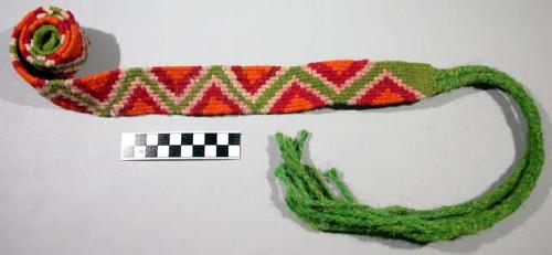 Belt, made of wool in the manner of a mule girth.