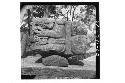 Sculptured stone with seated figure