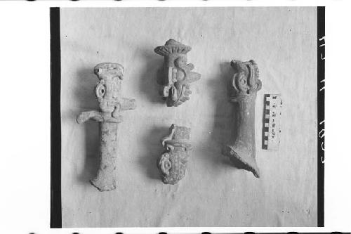 Four Fragmentary Serpant-Head Handles of Pottery Incensarios