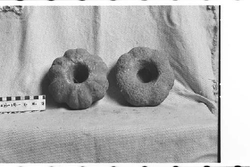 Two Carved Stone Mace or Club Heads