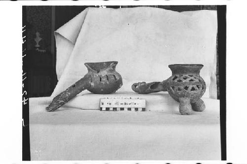 Two Fragmentary Mixtec Cut-Out Tripodal Incensarios