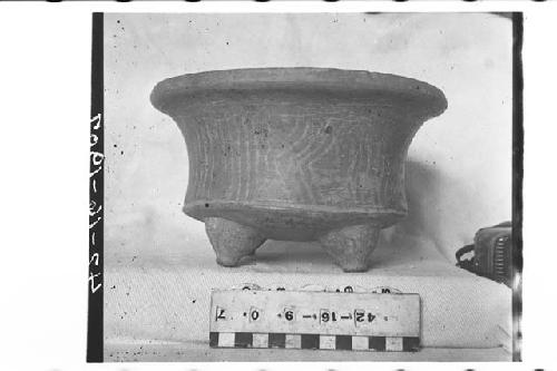 Tetrapodal lost-color vase