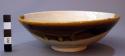 Brown and cream colored glazed porcelain bowl - used in tea ceremony