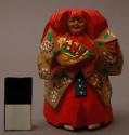 Figurine representing actress in noh theater - woman painted in red
