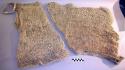 Trade bundle containing two nets wrapped in bark cloth (bought for +