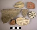 Potsherds, 5 black-on-red, 2 black and red on buff polychrome, 5 black-on-white,