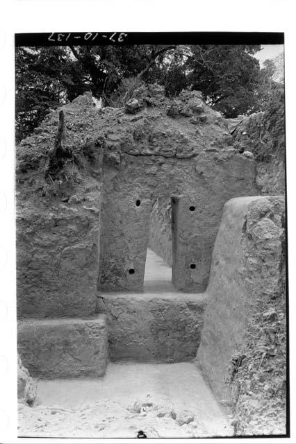 Looking north at the doorway in the south end of Room 2, Structure B-XIII