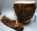 Wood and fur drum with attached fur bag. Ngona.