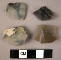 4 flint notched flakes and fragments
