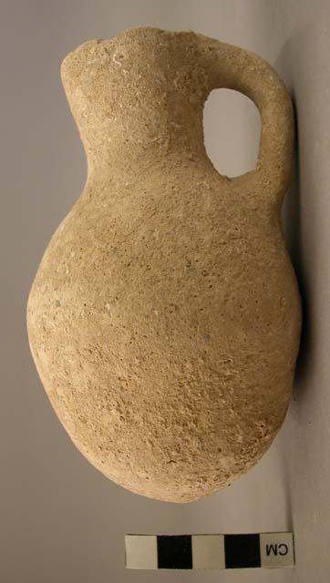 Short pointed pottery juglet