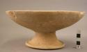 Pottery bowl with hollow spreading pedestal