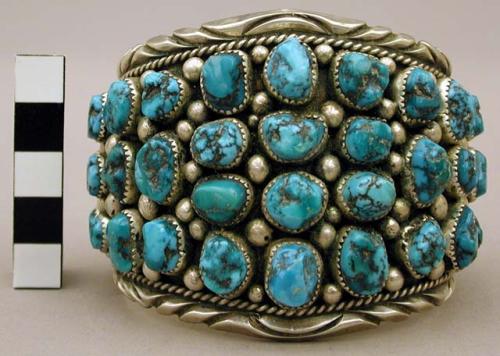 Cuff bracelet, silver band set w/ many small turquoise nuggets