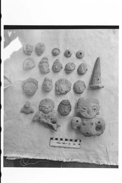 Fifteen Figurine Fragments; Two Spindle Whorls; Incised Leg of Pottery Vessel