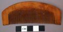 Native-made, wooden comb