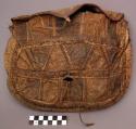 Bag, sewn fish skin panels form geometric designs, cloth edging on flap