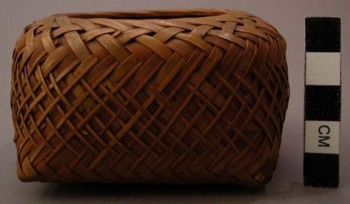 Miniature basket - square base with round opening at top