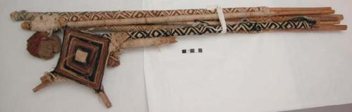 Bundle of bamboo "eye" rods bound together with original knots