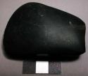 Stone axe heads and celts, ground and polished, e, f, and g appear to be basalt.