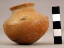 Miniature rounded-bottom pottery vessel - appliqued decoration