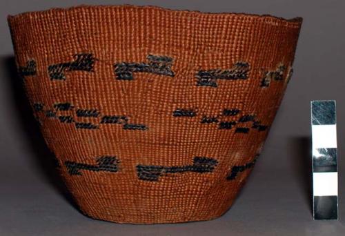 Closed wrap twined basket, possibly Tlingit, with false embroidery.