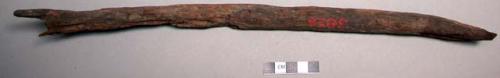 Wood, long bow-shaped fragment, possibly charred