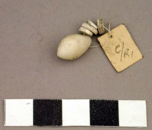 Alabaster pendants and ostrich shell beads