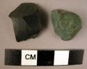 Fragment of greenstone & fragment of black stone