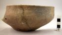 One-half of pottery bowl - undecorated, one handle