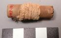 Ceremonial reed cigarette with "apron" attached
