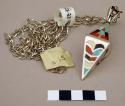 Silver chain with trapezoid-shaped pendant inlaid with stone & coral