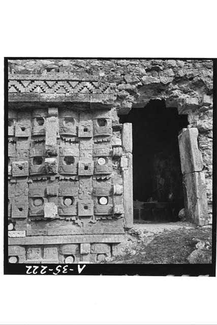 Masks and doorway on west facade,Str 2C6 (Casa 1); Rm 5