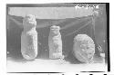 Three Sculptured stones, reportedly brought from Chuaj group. Ht. of tallest scu