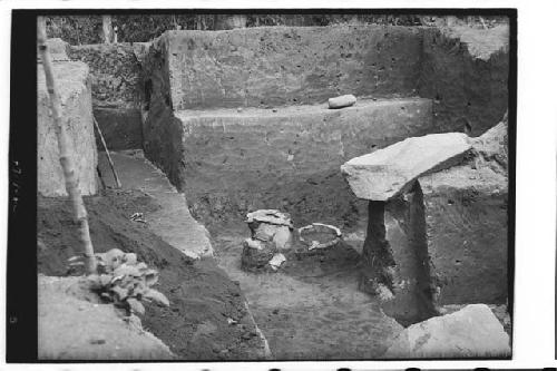 General view of excavation with urn burial and huge boulder