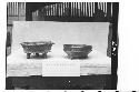 Two pottery vessels from tomb in ball court