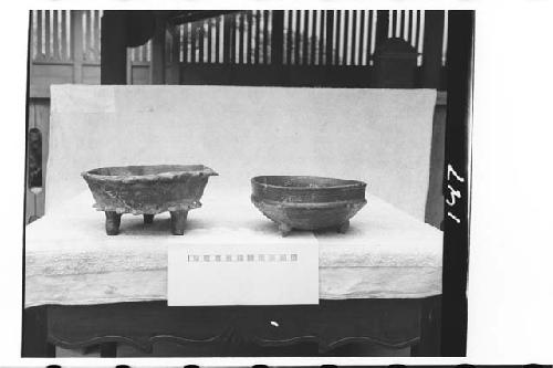 Two pottery vessels from tomb in ball court