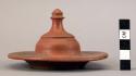 Ceramic, earthenware complete vessel, lid, finial handle, red slipped
