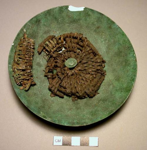 Fragments of woven wicker helmet base