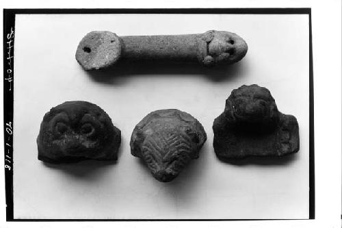 Pottery heads and incensario handle