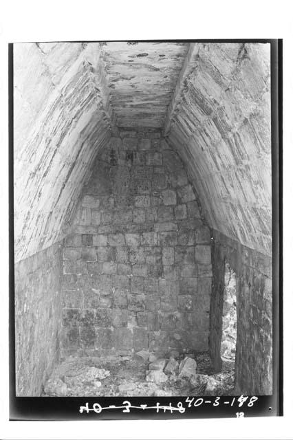 Glyphic Lintel Bldg., interior from S., room with glyphic lintel.