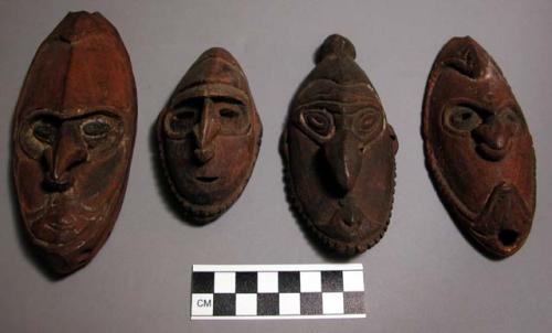 Small carved wooden masks