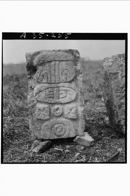 Individual stone from glyphic altar,  Str. 2B2