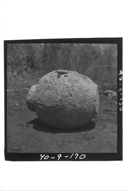 Stone ball, on side, W. of Palace.