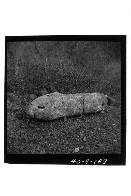 Stone phallus, broken in 4 parts; two parts in photo.