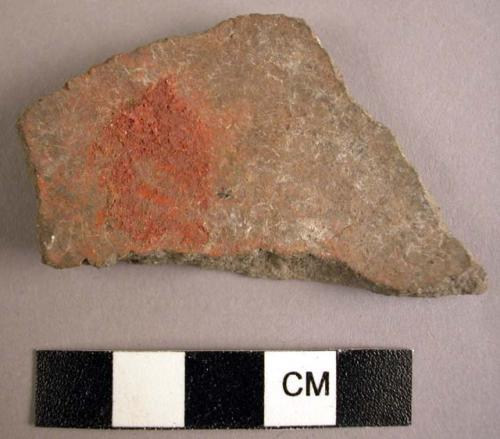 Paint on potsherd, 2 in.