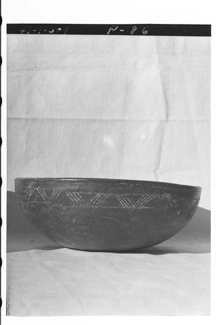 Black-brown bowl with incised decoration