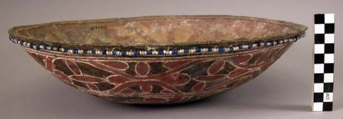 Ceramic, earthenware complete vessel, bowl, glass beads strung around rim, polychrome slipped, cord-impressed design