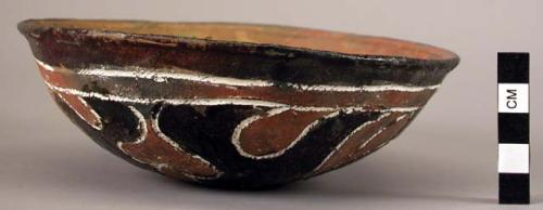 Earthenware bowl with cord-impressed and polychrome designs on exterior and polychrome designs on interior