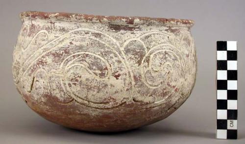 Ceramic, earthenware complete vessel, bowl, rounded base, polychrome slipped, cord-impressed designs, blackened base