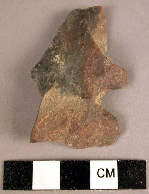 Stone, chipped stone projectile point, side-notched, iron stained, large, broken