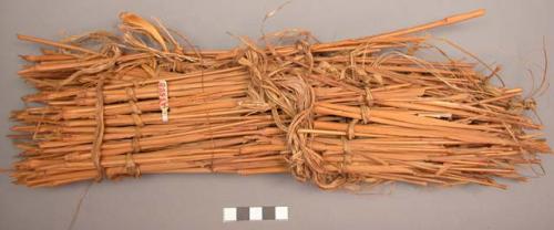 Fragment of grass stalk mat